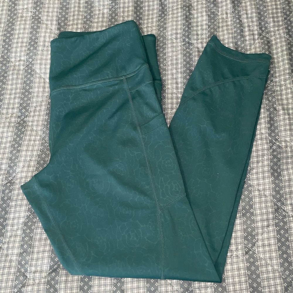 ZYIA active size 8-10. women’s leggings preowned. GUC, side pockets